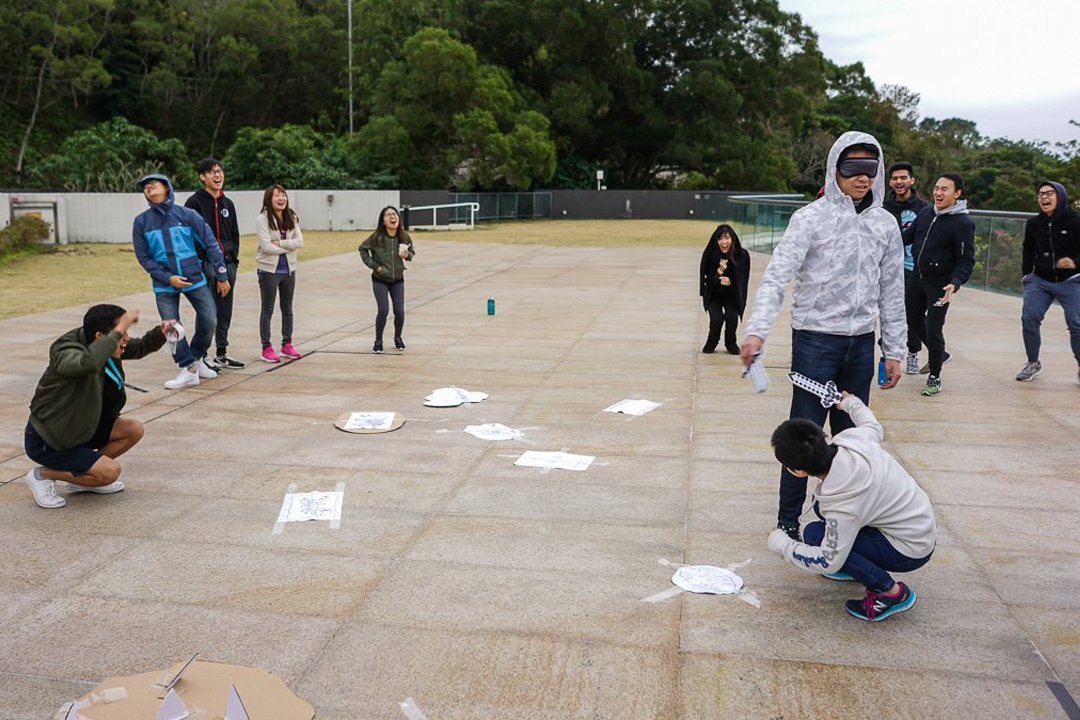 Students dueled in a makeshift labyrinth to experience the importance of communication.