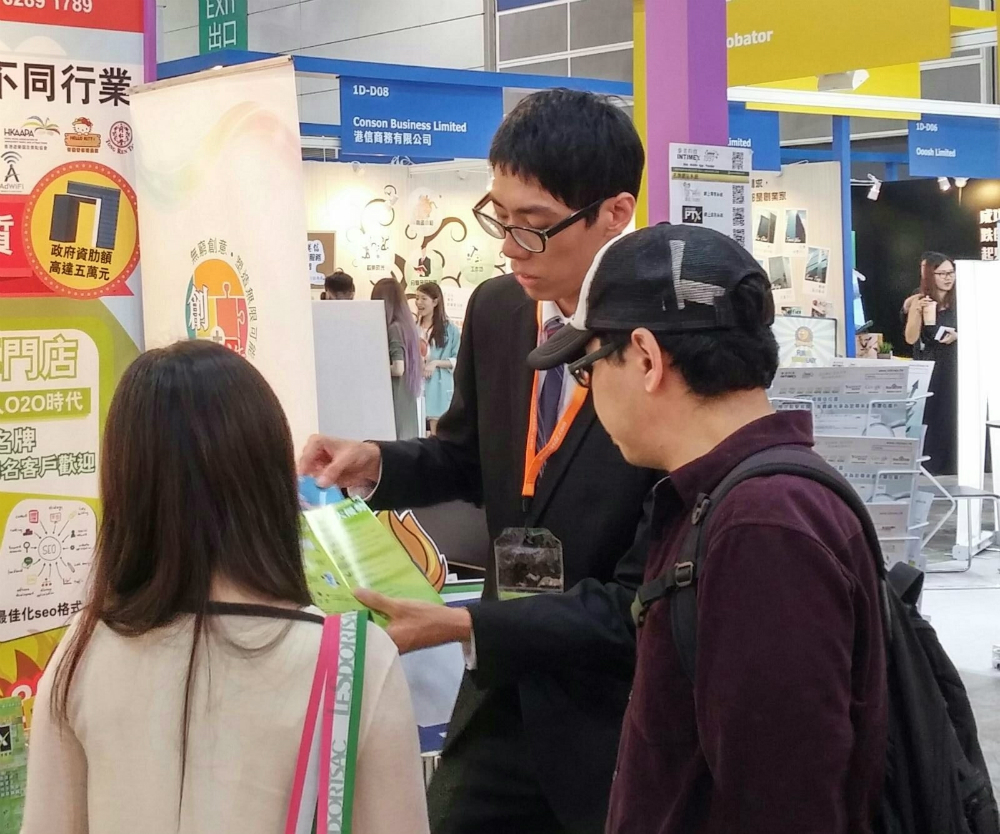 A student was promoting the HKTDC Entrepreneur Day at the Hong Kong Exhibition Centre.  