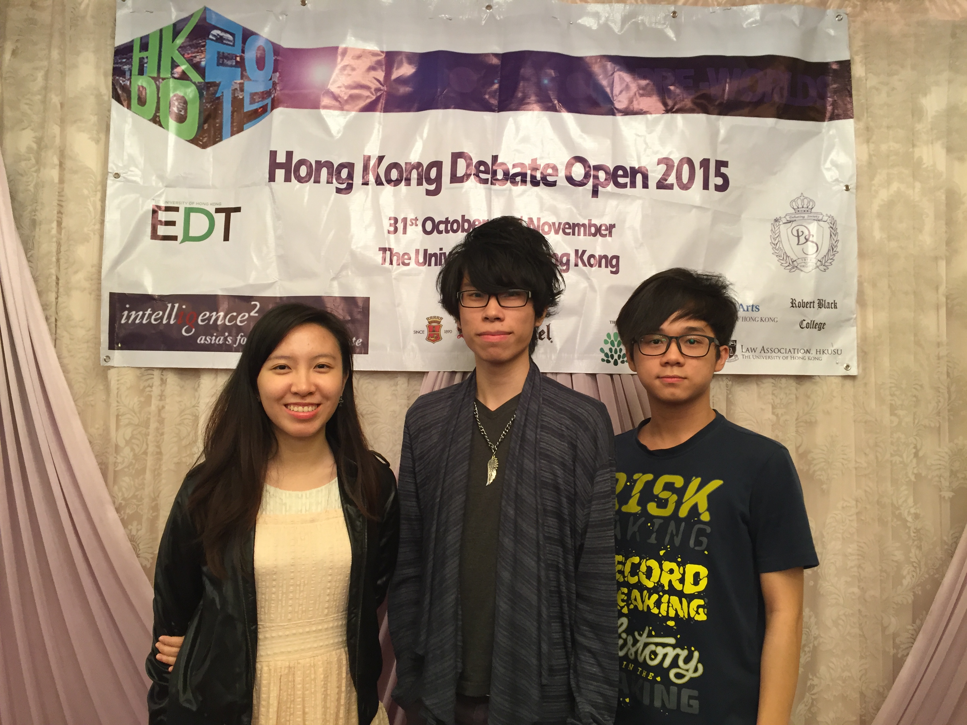 CIE Debaters at tournament banquet: (from left) SUN Tiana, SOO Chun Kwan Animus, and CHING Tsz Lok Steven